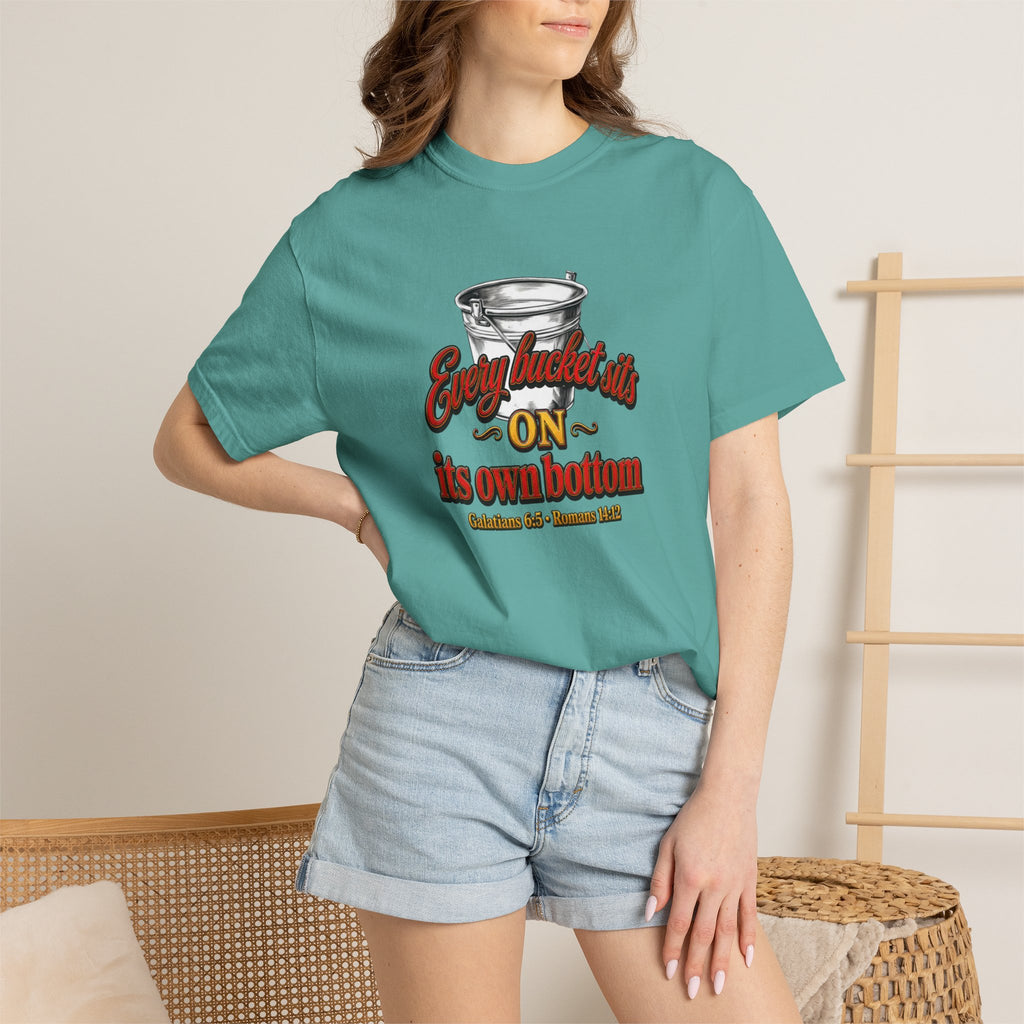 T-Shirt — "Every bucket rests on its own bottom" Graphic Tee (Faith-Based)