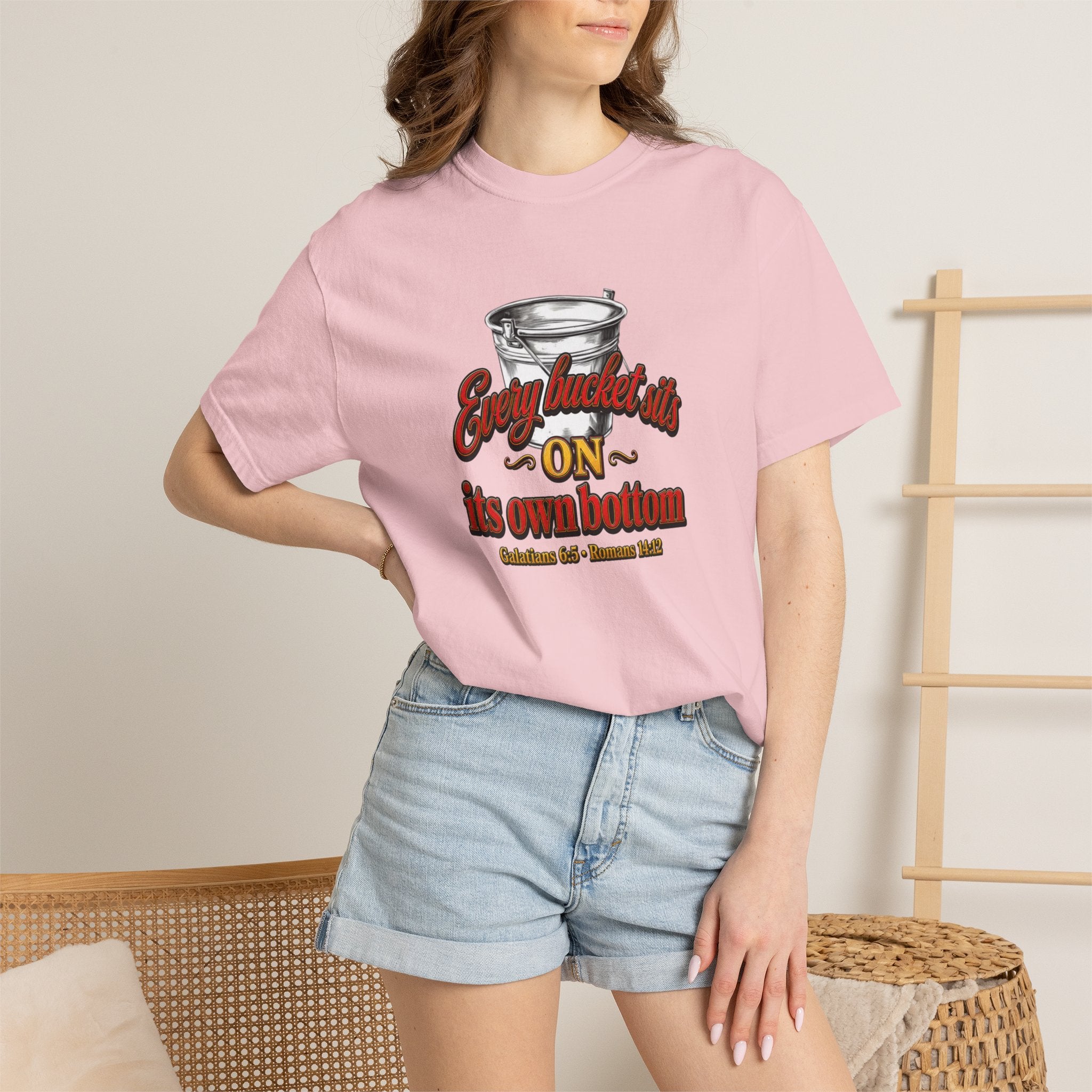 T-Shirt — "Every bucket rests on its own bottom" Graphic Tee (Faith-Based)