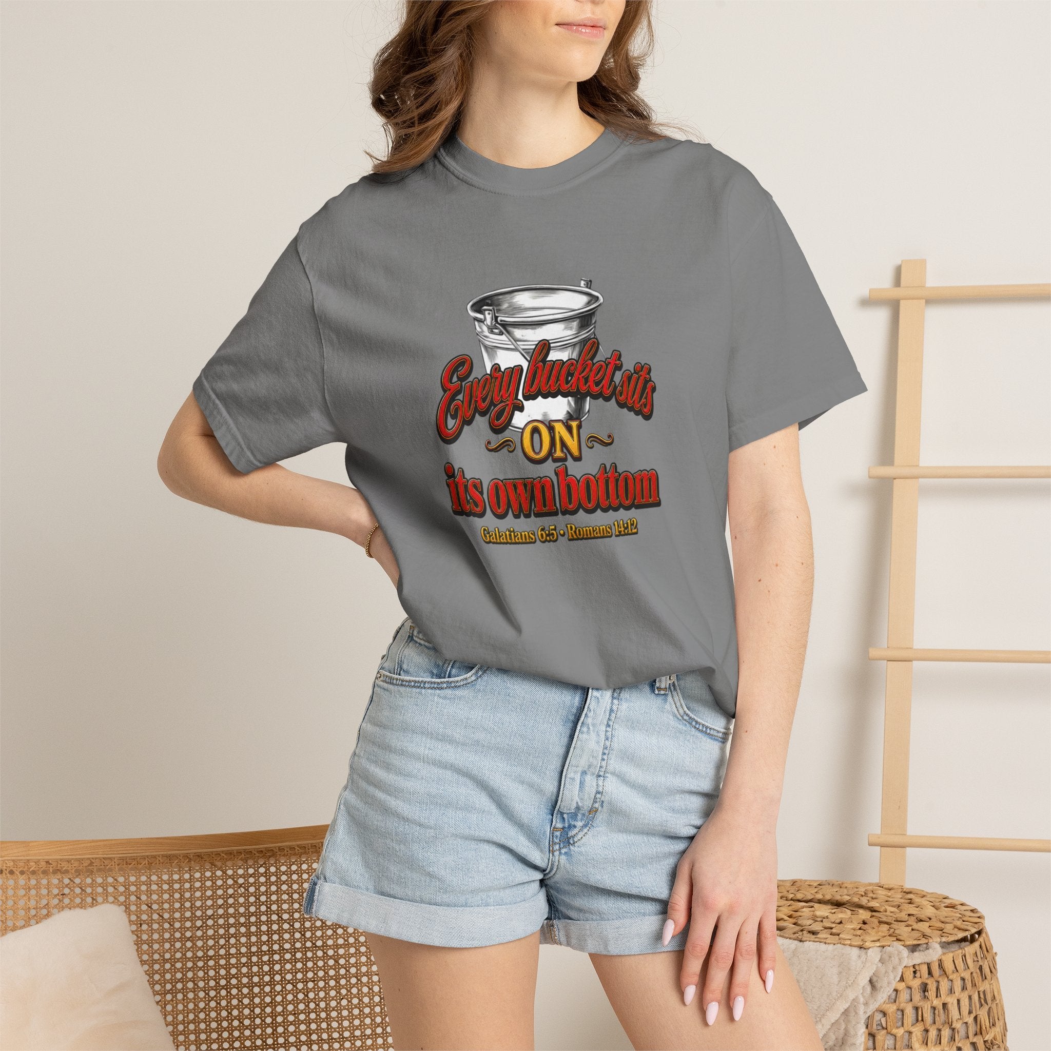 T-Shirt — "Every bucket rests on its own bottom" Graphic Tee (Faith-Based)